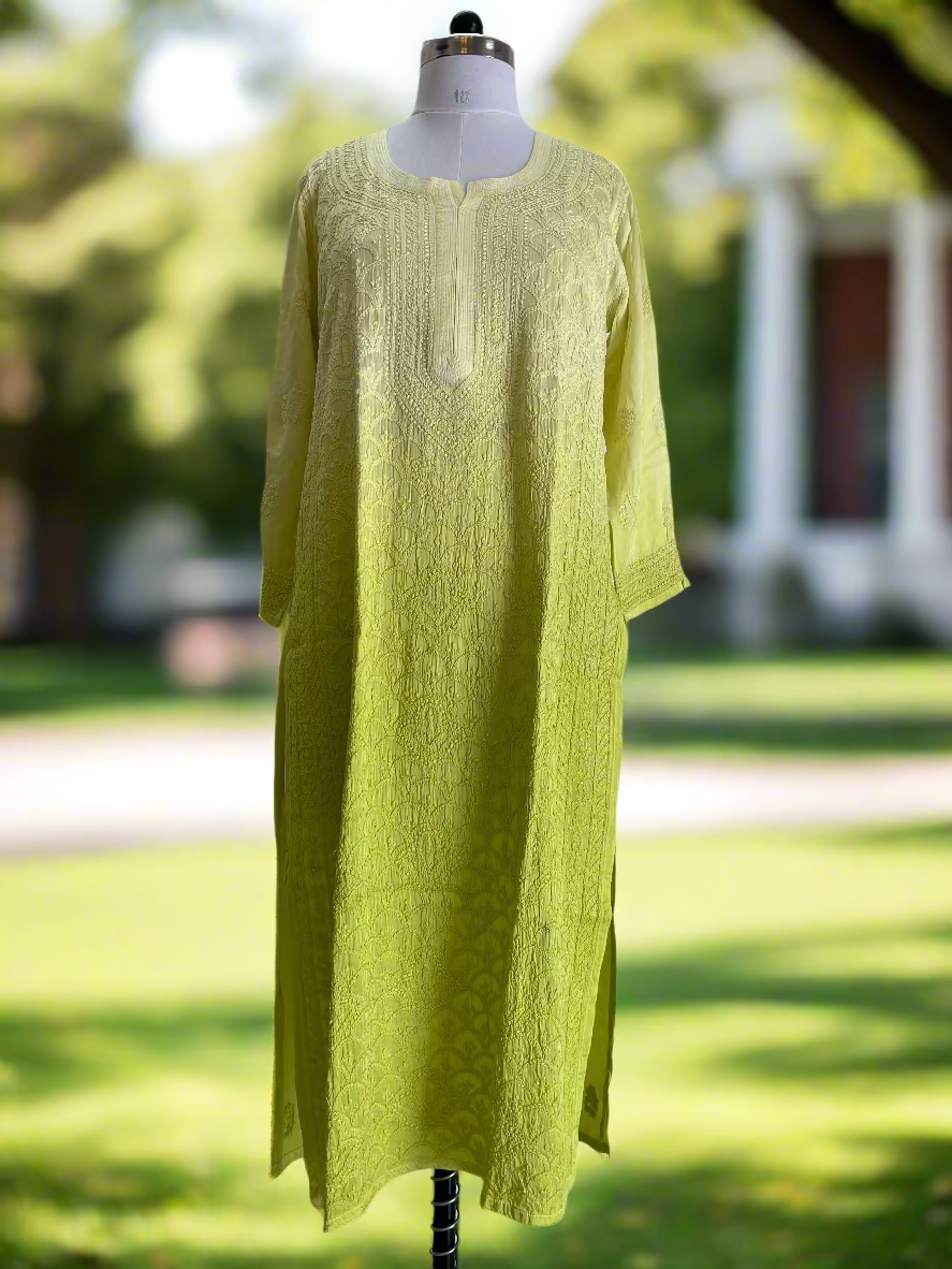 Yellow dress on a mannequin against a white background