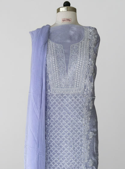 Light purple fabric with intricate white chikankari embroidery on muslin fabric 