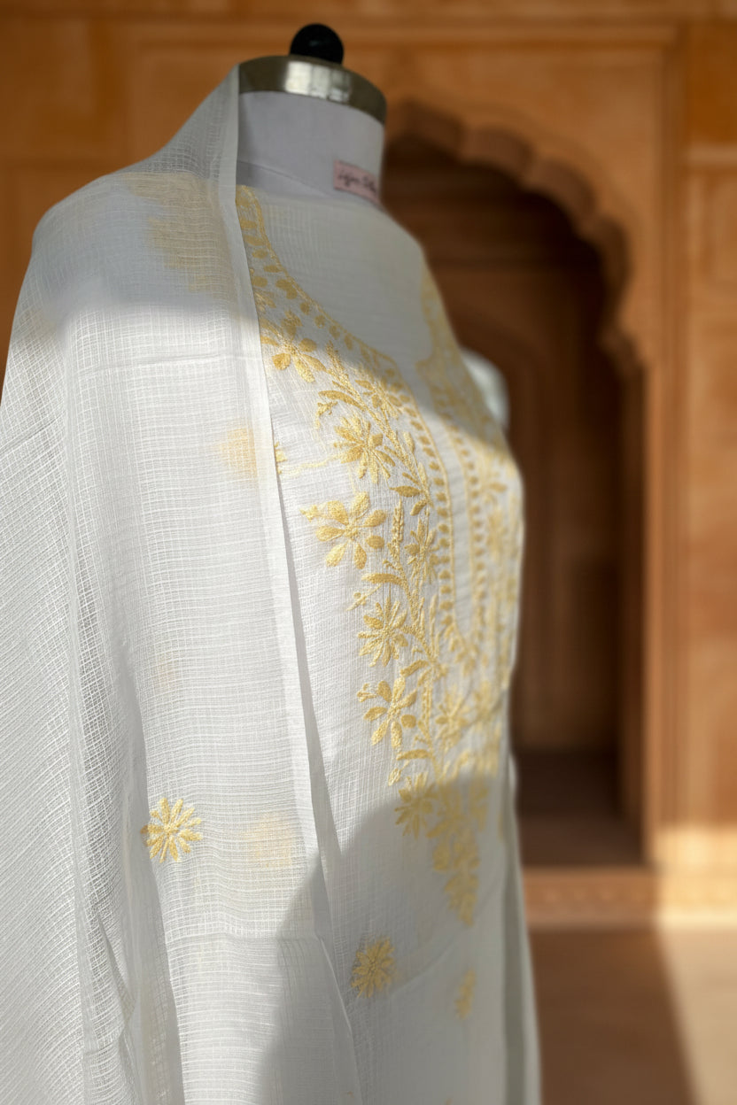 Unstitched Chikankari Suit Material – kota doriya with Hand-embroidered chikankari ghaspatti stitch in Pastel yellow white – Lajjaa.
