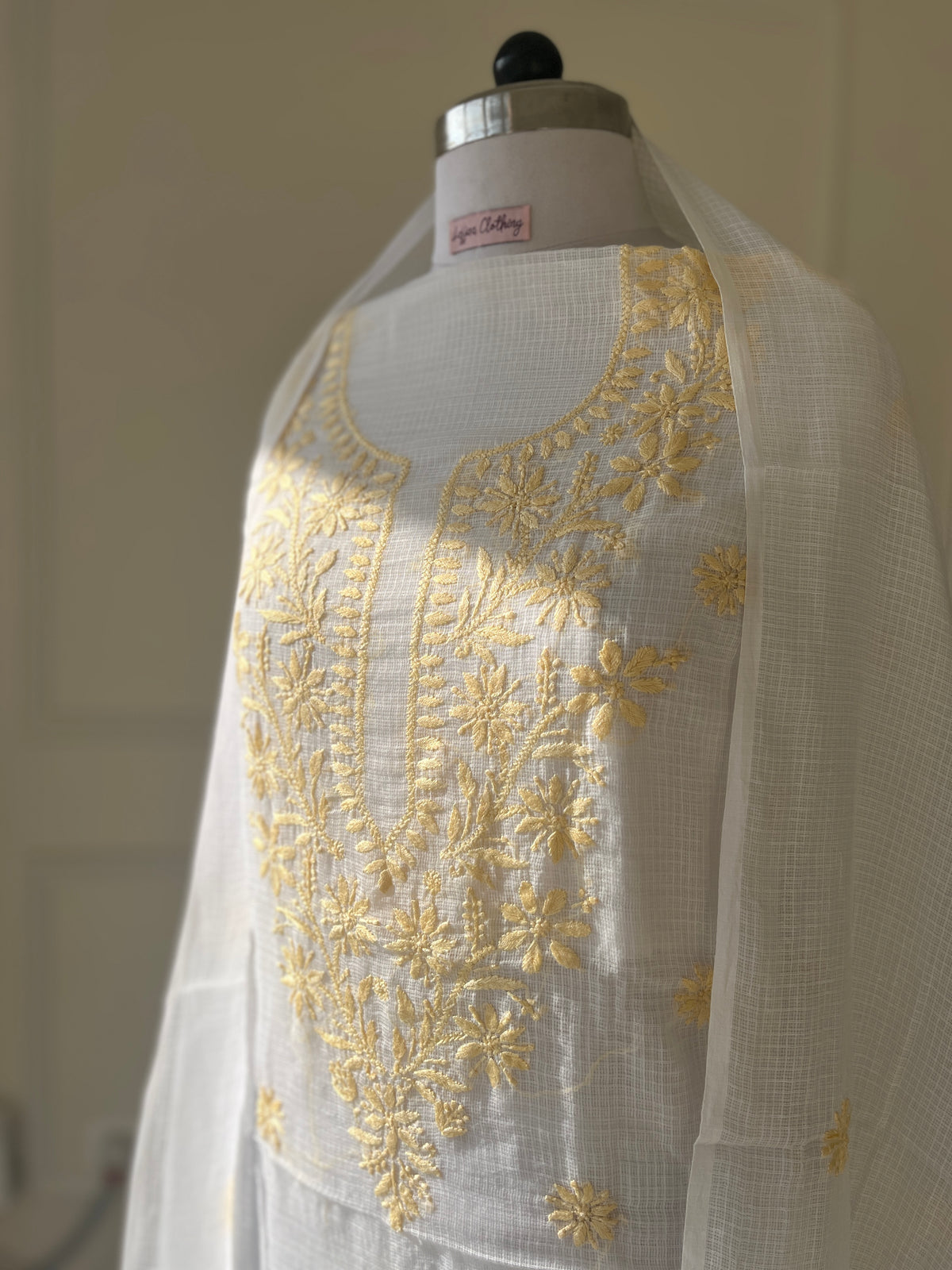 Unstitched Chikankari Suit Material – kota doriya with Hand-embroidered chikankari ghaspatti stitch in Pastel yellow white – Lajjaa.
